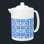 Carrelage bleu théière<br><div class="desc">Cette théière est montrée en blanc avec une belle imitation de tuiles bleues. Taille moyenne affichée. Customisez cet objet ou achetez tel quel. Stock Imprimer freepik.com</div>