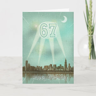 Carte 67e anniversaire avec une ville et des spots