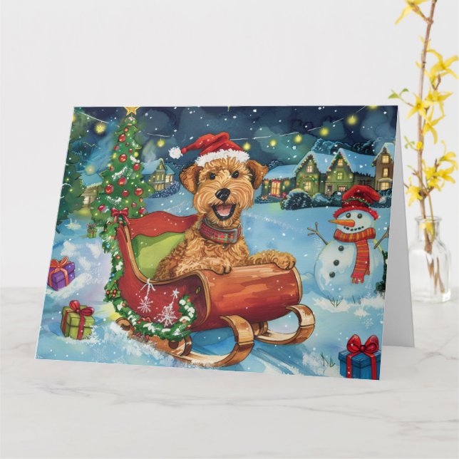 Carte Airedale dans un traîneau Noël enneigé (Fleur jaune)