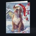 Carte American Staffordshire Winter Wonderland Noël<br><div class="desc">son design festif reflète l'esprit joyeux de la période des fêtes, avec un adorable petit portant un chapeau de Père Noël. Le chat est niché dans un pays des merveilles hivernales, avec un bonhomme de neige, un sapin de Noël décoré et des cadeaux joliment emballés. Les flocons de neige tombent...</div>