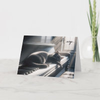 Anniversaire Chat Napping sur une touche de piano