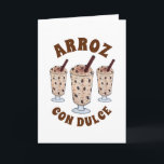Carte Arroz con Dulce Pudding de riz à la noix de coco d<br><div class="desc">Le design présente une illustration originale d'un délicieux arroz con dulce, un pudding de riz portoricain composé de riz perlé mijoté dans du lait de coco, de la crème de coco, du lait concentré, d'épices et de raisins secs macérés dans du rhum. Cette friandise est particulièrement populaire à Porto Rico...</div>