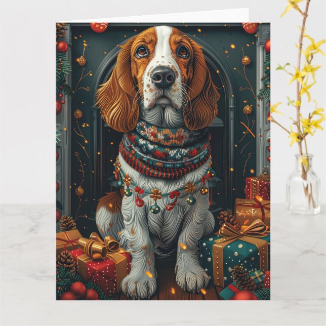 Carte Basset Hound avec des cadeaux de Noël devant une c (Fleur jaune)
