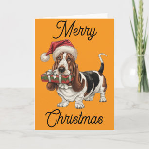 Carte Basset Hound avec un chapeau de Père Noël et un ca
