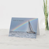 Bateau à voile et retrait arc-en-ciel