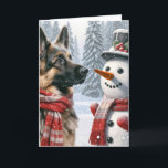 Carte Berger Allemand De Noël Avec Snowman<br><div class="desc">Un berger allemand portant une écharpe rouge et blanche se tient à côté d'un bonhomme de neige et un chapeau au milieu d'un paysage enneigé Texte peut être changé.</div>