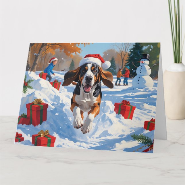 Carte Bluetick Coonhound courant dans la neige avec Noël (Devant)