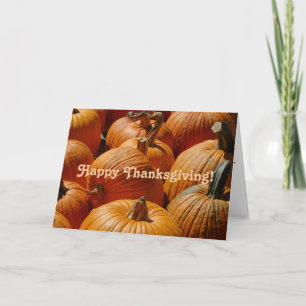 Carte Bon thanksgiving sur un arrière - plan citrouille