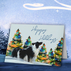 Carte Border Collie dans l'arbre de Noël sous la neige d