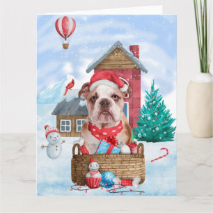 Carte Bouledogue anglais dans la maison de Noël enneigée