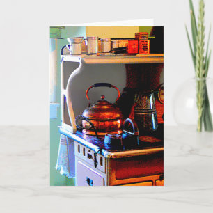 Carte Bouteille de thé en cuivre sur le réchaud