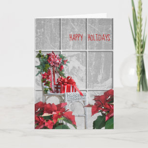 Carte Chaise de Noël avec poinsettia dans la fenêtre