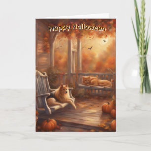 Carte Chat et chien d'Halloween heureux sur un porche av