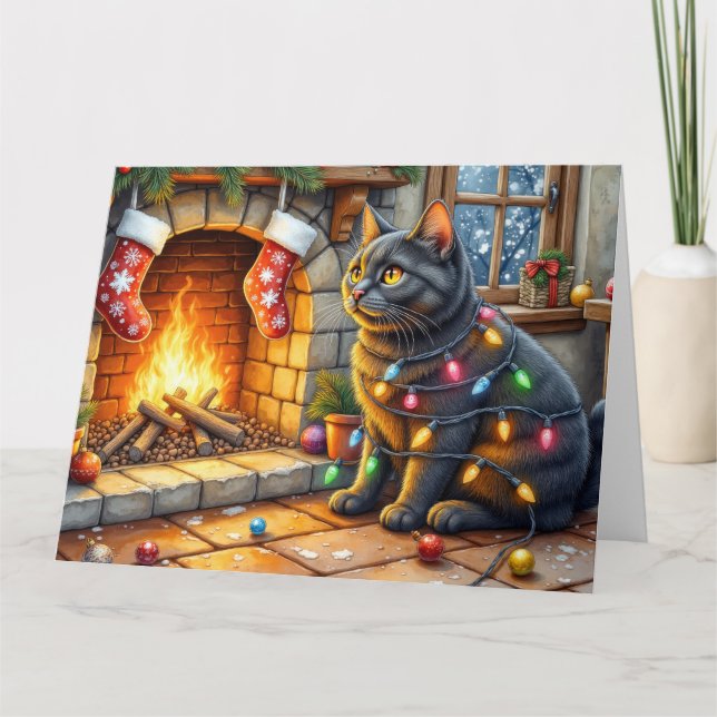 Carte Chat noir assis près d'une cheminée avec des lumiè (Devant)
