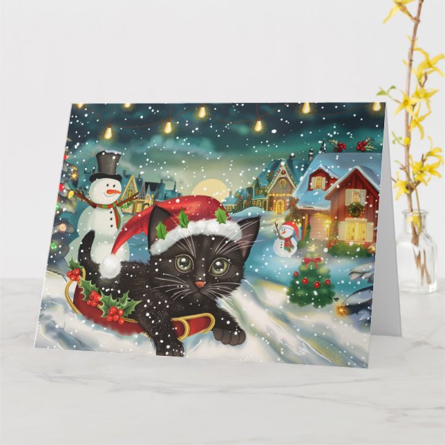 Carte Chat noir dans un traîneau Noël enneigé (Fleur jaune)