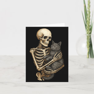 Carte Chat qui étreint un squelette pour les amoureux de