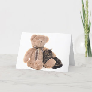 Carte chaton dans les bras d'un ours en peluche