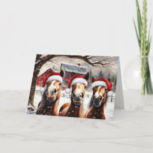 Carte Chevaux de Noël sous la neige avec des chapeaux de