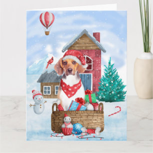 Carte Chien Beagle dans une maison de Noël enneigée