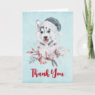 Carte Chien Husky de Noël dans un chapeau de Père Noël M