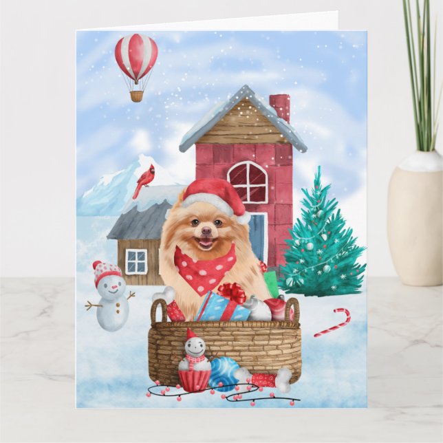 Carte Chien Pomeranian dans la maison de Noël enneigée (Devant)
