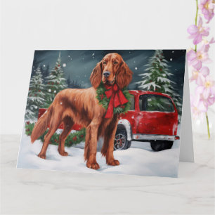 Carte Chien rouge irlandais à la neige Noël