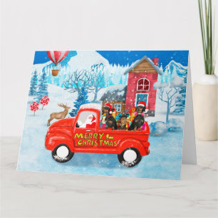 Carte Chien teckel dans un camion de livraison de Noël e