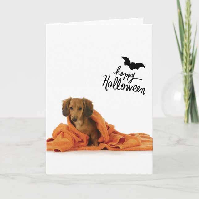 Carte Chiot mignon de teckel dans Halloween couvrant (Devant)