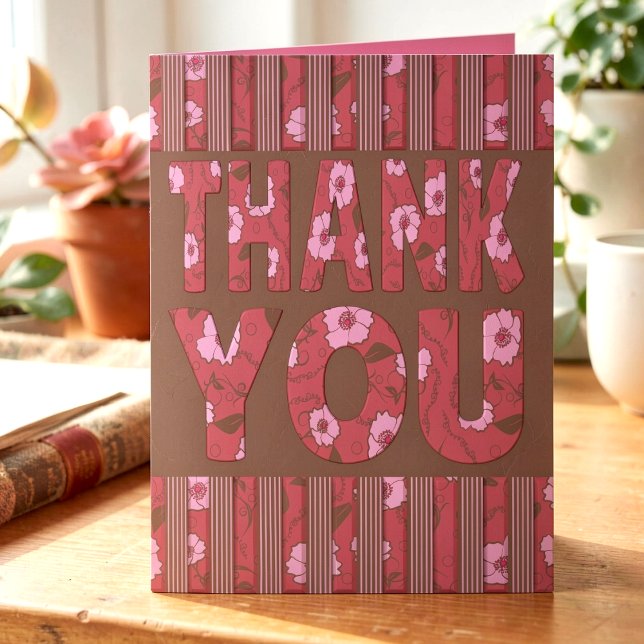Carte Chocolat et fleurs roses et rayures Merci (Bold text filled with pink flowers, vines and leaves, topped by stripped borders top & bottom.)