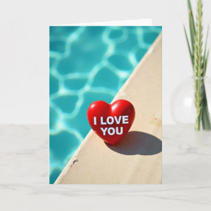 Carte cœur « Je t'aime » au bord de la piscine
