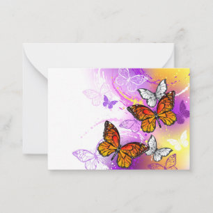 Carte Conseil Papillons Monarque sur Arrière - plan pourpre