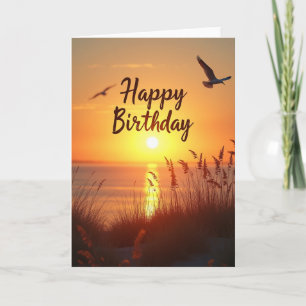 Carte côtière d'anniversaire au coucher de soleil