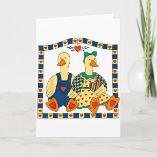 Carte Couple de canards d'art folklorique avec des cœurs