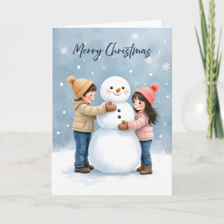 Carte Cozy Kids Building a Snowman Blank Christmas