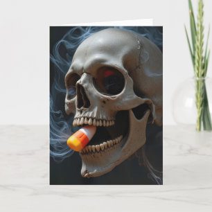 Carte Crâne fumeur d'Halloween mordant le maïs de bonbon