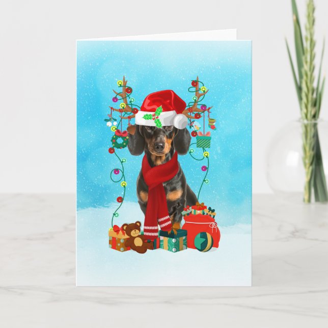 Carte Dachshund dans la neige avec cadeaux de Noël (Devant)