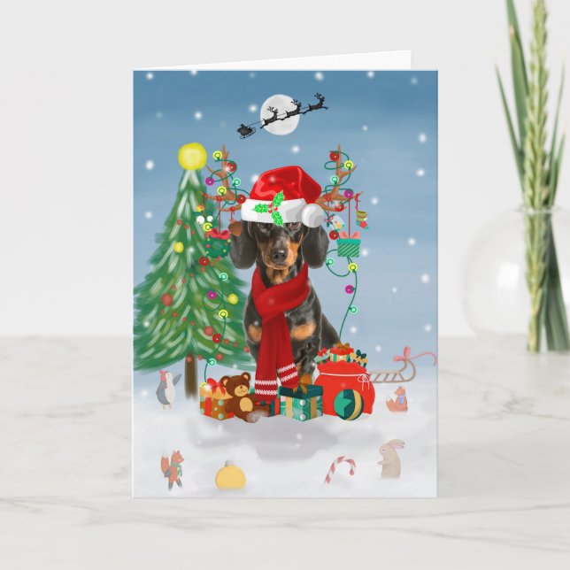 Carte Dachshund dans la neige avec des cadeaux de Noël  (Devant)