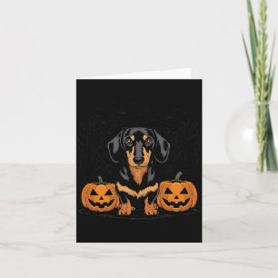 Carte Dachshund noir et feu Halloween avec