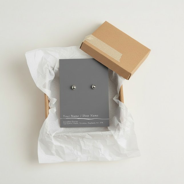 Carte d'affichage gris plat simple (Simple flat grey earring display card.)