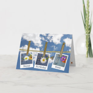 Carte daisy in blue jean pocket on clothesline
