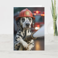 Dalmatien d'anniversaire tenant un tuyau d'incendi