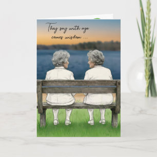 Carte Dames âgées discutant sur un banc au bord d'un lac