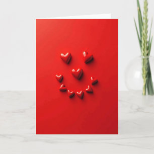 Carte d'amour à sourire de cœurs rouges
