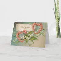 Carte d'anniversaire avec les coeurs et le muguet