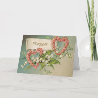 Carte d'anniversaire avec les coeurs et le muguet