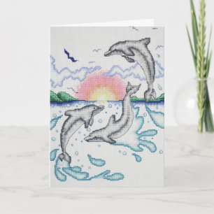 Carte Dauphins jouant à la plage océane au lever du sole