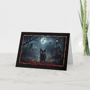 Carte de Bonne Halloween avec un petit chat noir q