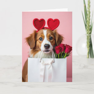 Carte de la Saint-Valentin avec chiot et roses