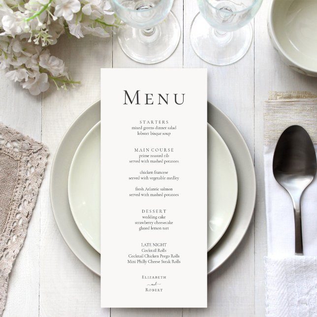 Carte de menu Mariage minimaliste moderne (Modern Minimalist Typography Wedding Menu Card on a silver grey wedding table with white flowers)