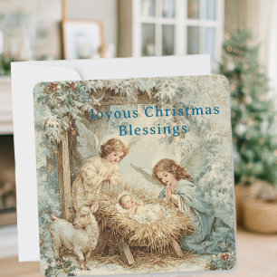 Carte de Noël avec bébé Jésus dans une mangeoire e
